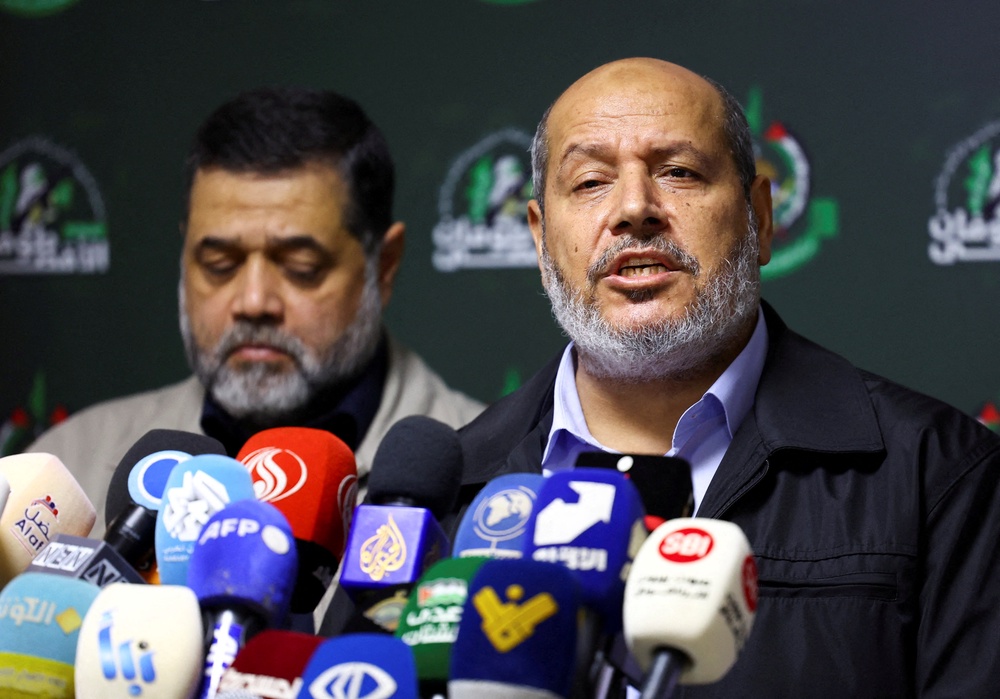 Hamas officials, Khalil al-Hayya (right) and Osama Hamdan, at a press conference in November 2023 (Reuters)