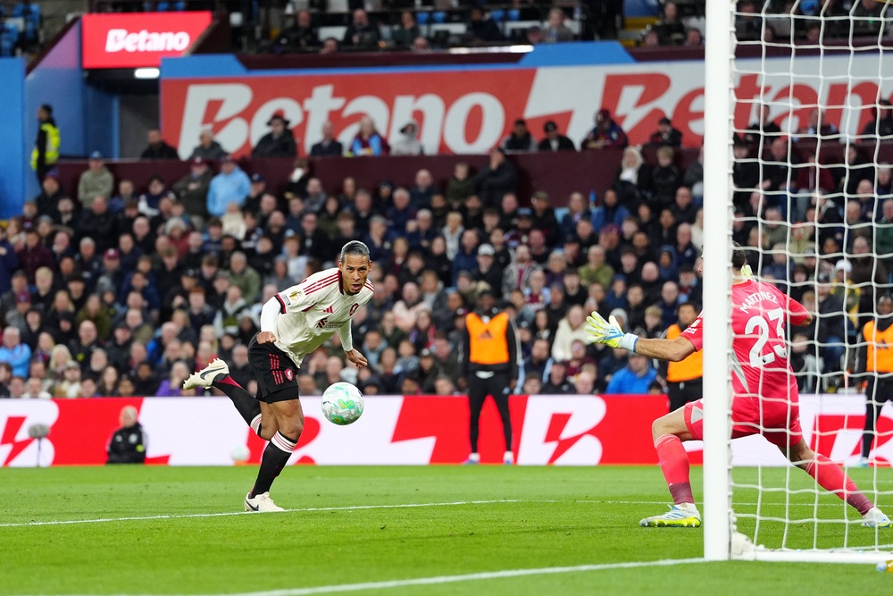 Virgil van Dijk scores the equaliser for Liverpool just after the restart (PA)