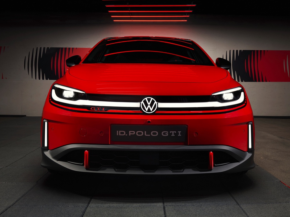 The Volkswagen ID. Polo gets the traditional red stripe across the front, sitting below an LED light strip and illuminated VW badge (Volkswagen)