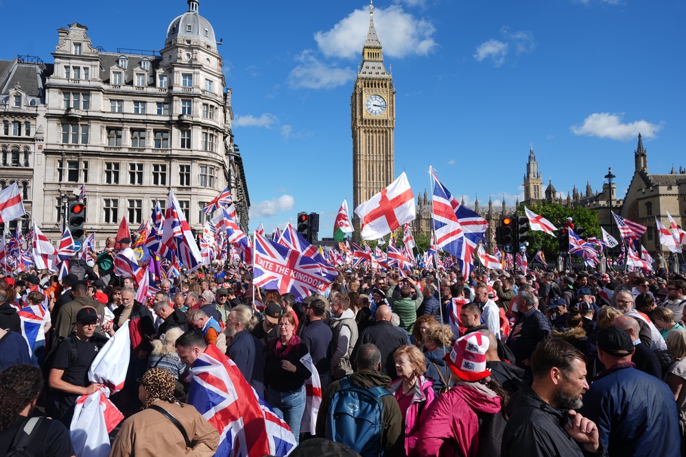 People taking part in the Tommy Robinson-led Unite the Kingdom march and rally in Parliament Square, central London in September 2025 (Lucy North/PA) (PA Archive)