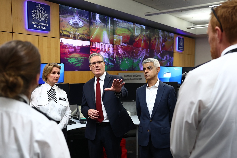 Prime Minister Sir Keir Starmer and Mayor of London Sir Sadiq Khan speak with police officers and staff ahead of Saturday’s protests (Peter Nicholls/PA) (PA Wire)