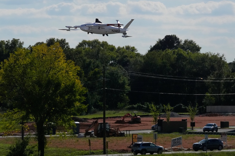 A drone operated by Zipline flies to make a delivery from a Walmart store (Copyright 2025 The Associated Press. All rights reserved)