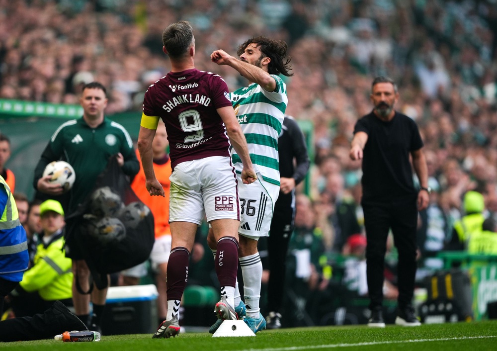 Tempers flare between Celtic's Marcelo Saracchi and Hearts’ Lawrence Shankland (Andrew Milligan/PA Wire)