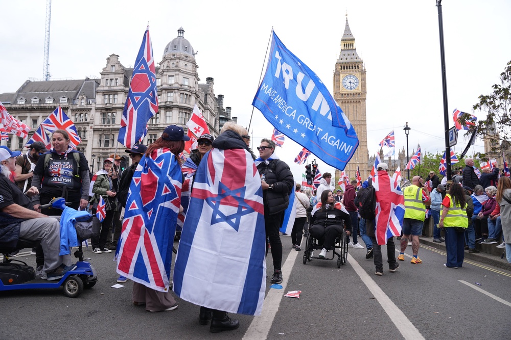 People take part in Tommy Robinson's Unite the Kingdom march in central London. (Maja Smiejkowska/PA Wire)