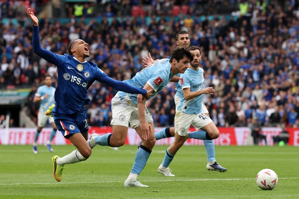 Joao Pedro goes down looking for a penalty (AP)