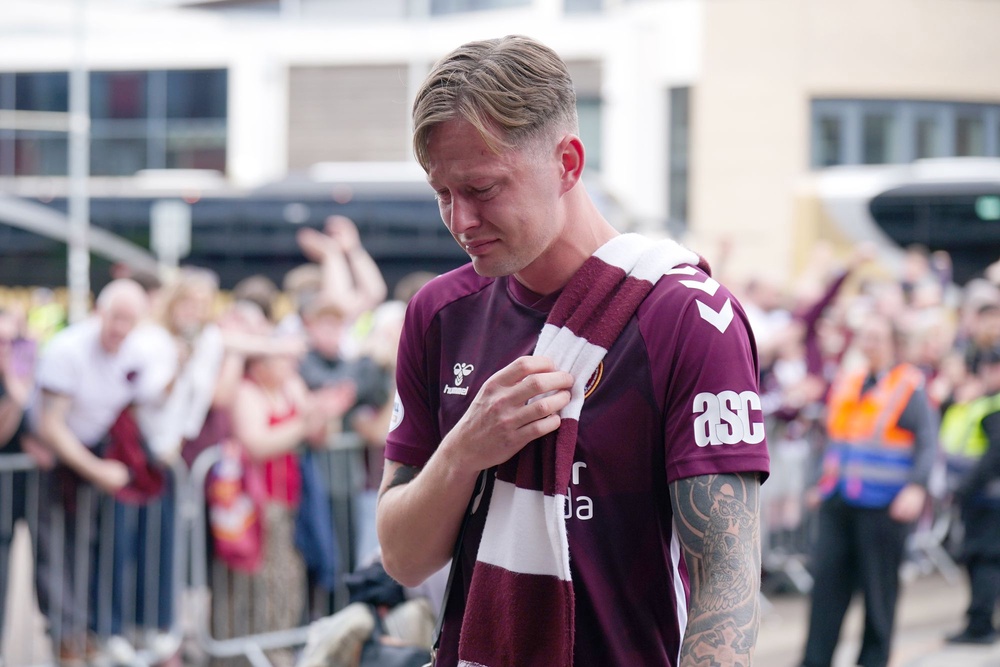 Heart of Midlothian player Frankie Kent becomes emotional as he walks past fans (Jane Barlow/PA Wire)