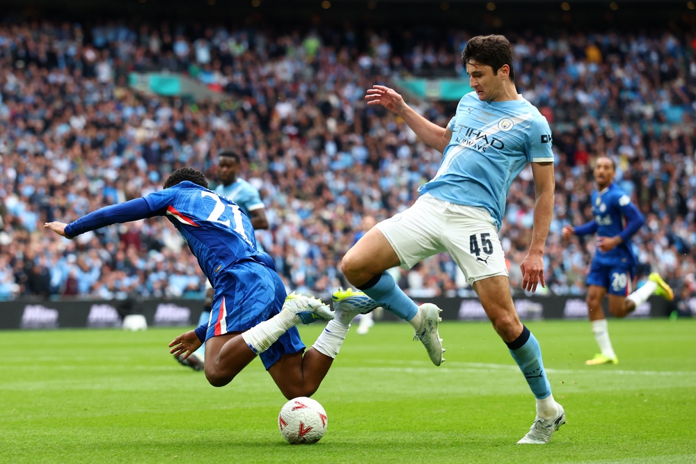Jorrel Hato has a penalty shout turned down by the referee (Getty)