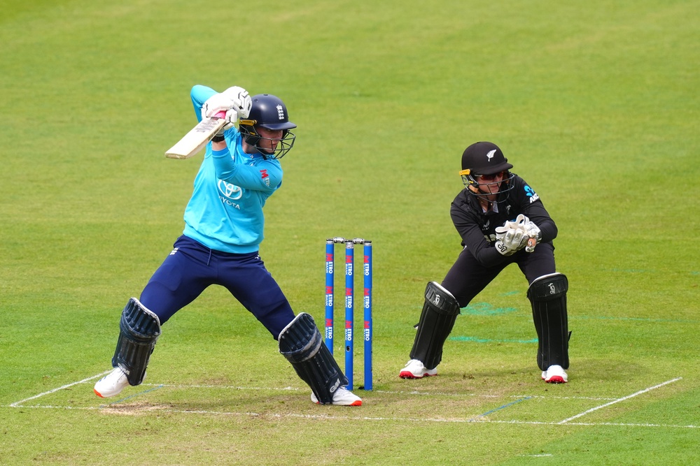 England’s Freya Kemp finds the boundary against New Zealand in Cardiff (David Davies/PA) (PA Wire)