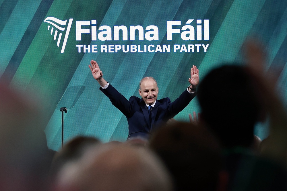 Micheal Martin is applauded by the crowd after his speech (Conor O Mearain/PA) (PA Wire)