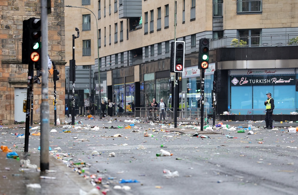 Litter-covered streets in Glasgow after Celtic won the William Hill Premiership title after a 3-1 win at home to Hearts (Steve Welsh/PA) (PA Wire)