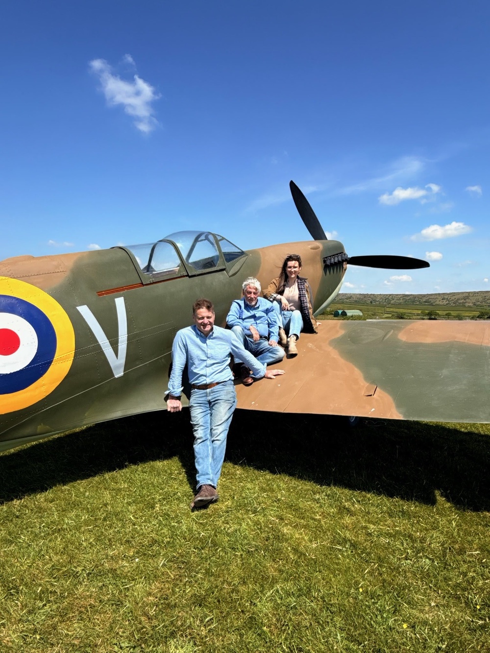 (from left) Jeremy Meeson, David Spencer Evans and Bridget Donaldson in front of an Aerolite Spitfire Type 433 (Aerolite Spitfire/PA)