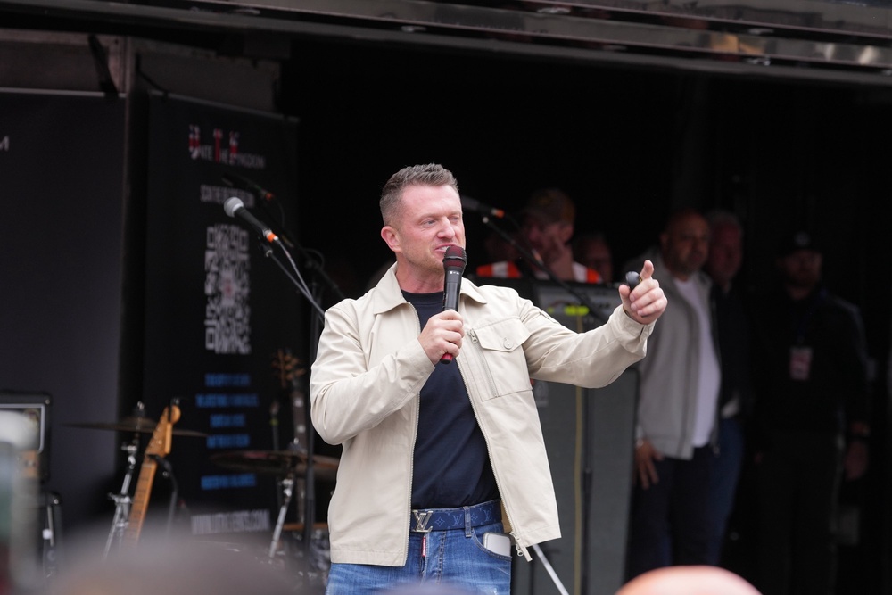 Tommy Robinson speaking on stage during the Unite the Kingdom march (Maja Smiejkowska/PA) (PA Wire)