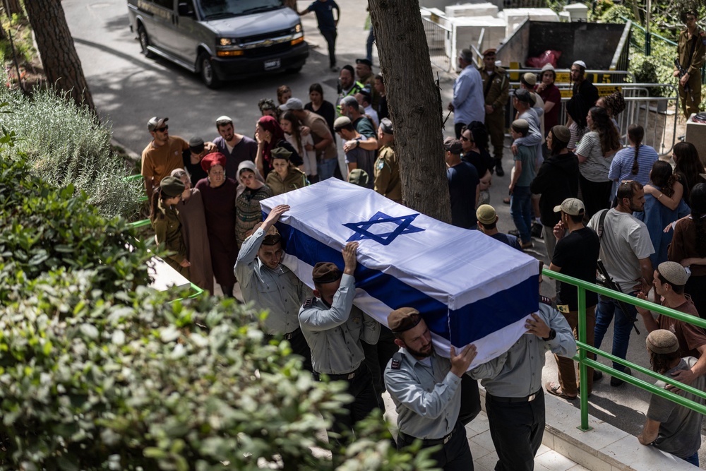 Soldiers carry the casket of Israeli army Captain Maoz Israel Recanati, who was killed in combat in Lebanon, during the funeral in Jerusalem (AFP/Getty)