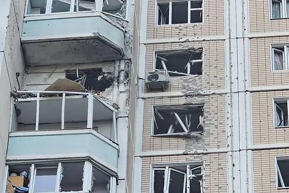 Damaged residential building following an air attack at an undisclosed location in the Moscow region (TELEGRAM / @vorobiev_live/AFP vi)