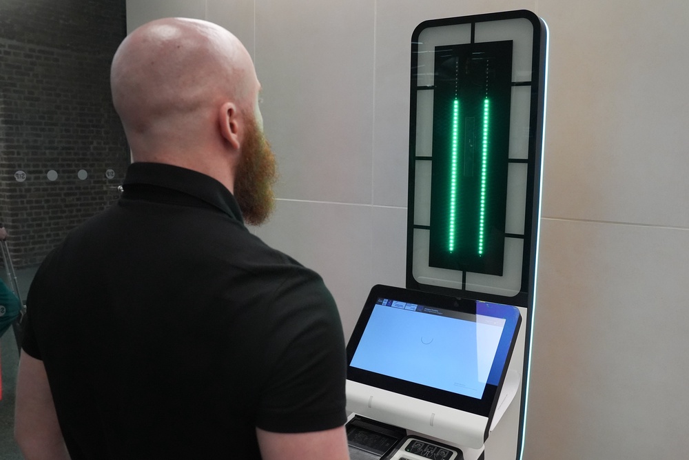 A person using an EES kiosk (PA) (PA Archive)