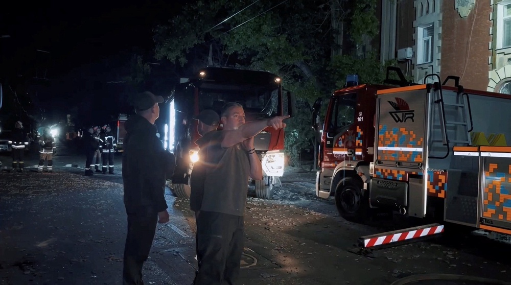 Rescuers work at the site of a Russian drone strike in Odesa region (Reuters)
