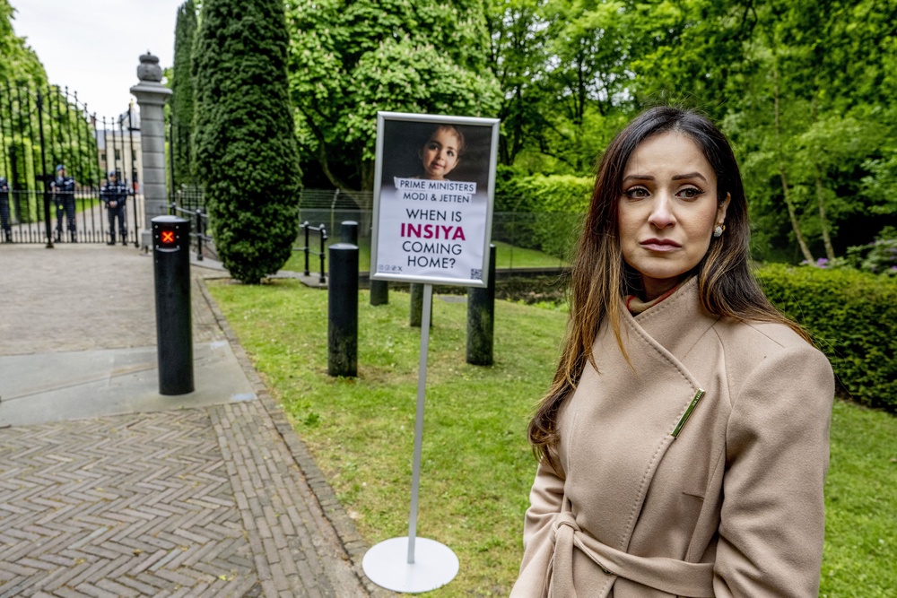 Nadia Rashid, mother of Insiya Hemani, protests during Narendra Modi's visit outside the Huis ten Bosch Palace (Getty)