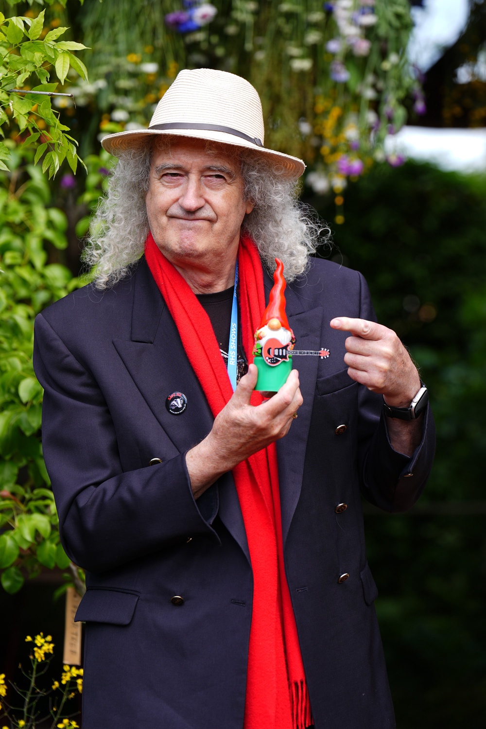 Sir Brian May holding his ‘Billy Bad-Axe’ gnome (Aaron Chown/PA)