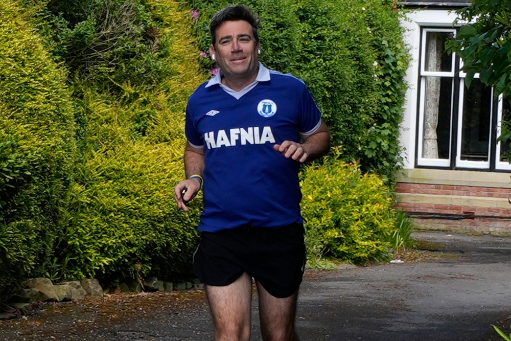 The mayor of Greater Manchester, born on the outskirts of Liverpool, is a match-going Everton fan (PA)