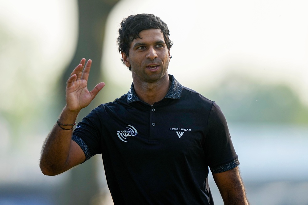 Rai waves on the 18th green after his final round (AP)