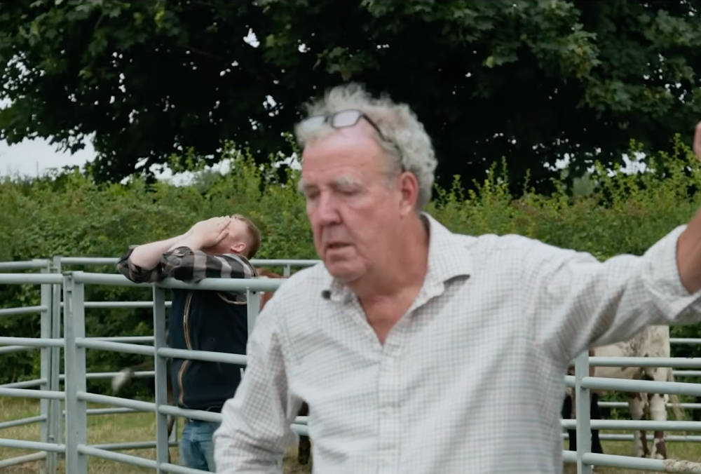 Clarkson and Cooper being told that the farm is being placed under 'restrictions' (Prime Video)