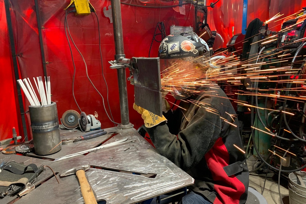 While recognizing her pioneering role, she downplayed welding's gender aspect (AP Photo/Mike Householder)