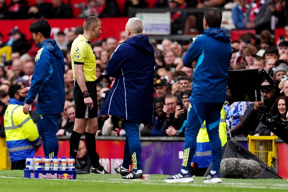 Referee Michael Salisbury stuck with his on-field decision after looking at his pitchside monitor (PA Wire)