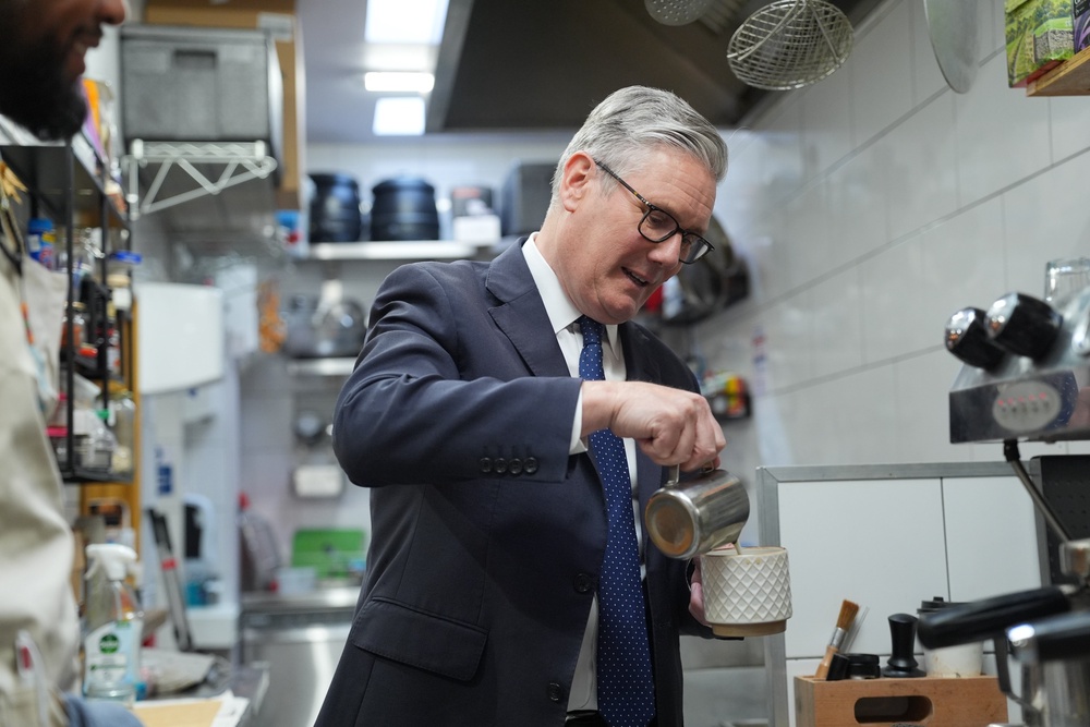 Keir Starmer pours a cup of tea as Labour’s political turmoil continues (PA Wire)