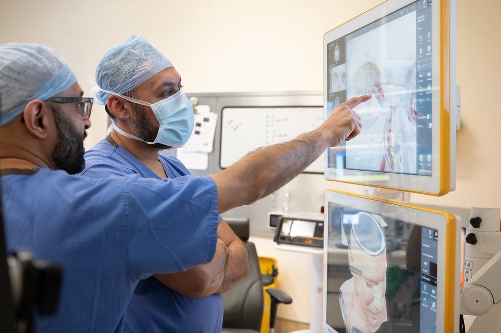 Consultant neurosurgeon Asim Sheikh and maxillofacial surgeon Jiten Parmar performed the operation on Andrew Wood at Leeds Teaching Hospitals NHS Trust (Leeds Teaching Hospitals NHS Trust/PA) (PA Media)