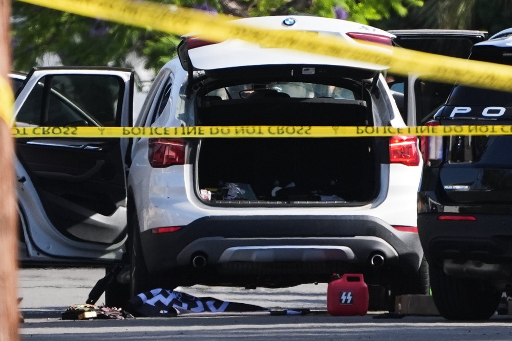 The car in which the San Diego mosque shooting suspects were found dead (AP)