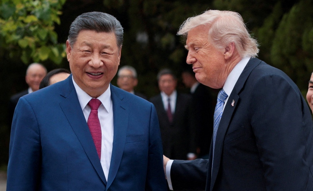 U.S. President Donald Trump speaks with Chinese President Xi Jinping while leaving after a visit to the Zhongnanhai Garden in Beijing, China, May 15, 2026. (Reuters)