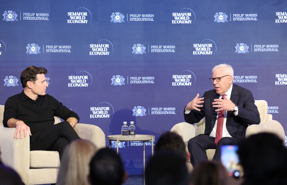 After Weiss elevated Tony Dokoupil (left) to anchor CBS Evening News, critics have accused him of going soft in his coverage of the Trump administration (Getty Images for Semafor World E)