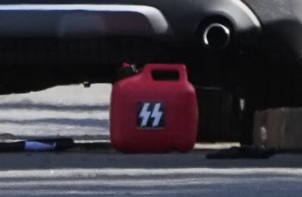 A gas canister marked with an “SS” symbol was found at the scene of a shooting at a San Diego mosque (AP)