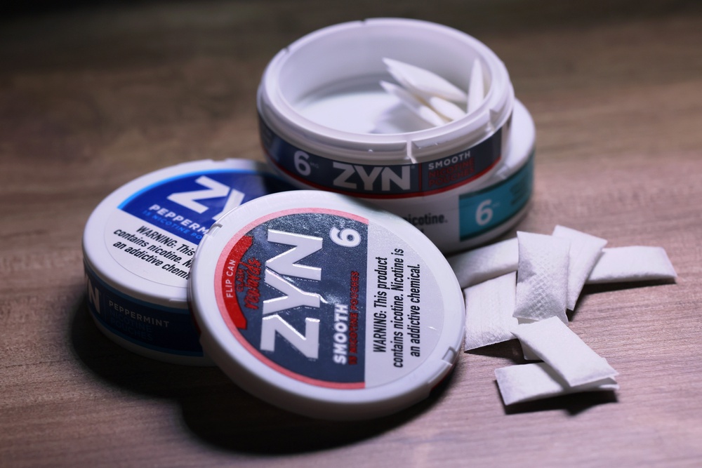Advocates say the tobacco-free pouches — which can be discreetly administered —deliver a nicotine rush without the cancer risks associated with cigarettes. Public health experts, though, warn that they carry cardiovascular risks and may pose dangers for young people (Getty Images)