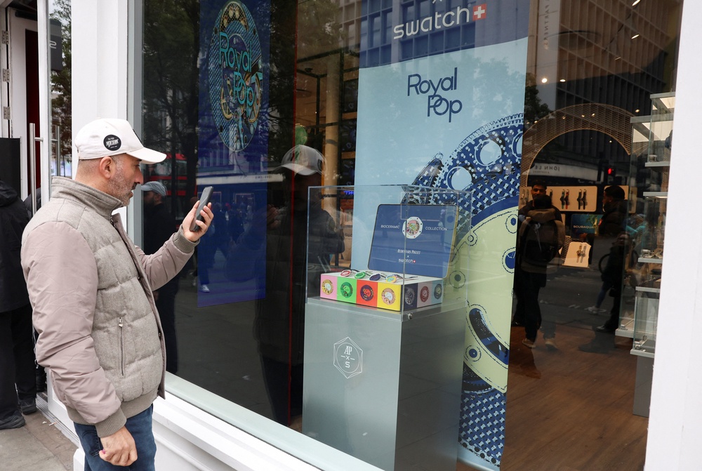 Swatch announced on Saturday that several stores would close for the day in response to the scenes (Reuters)