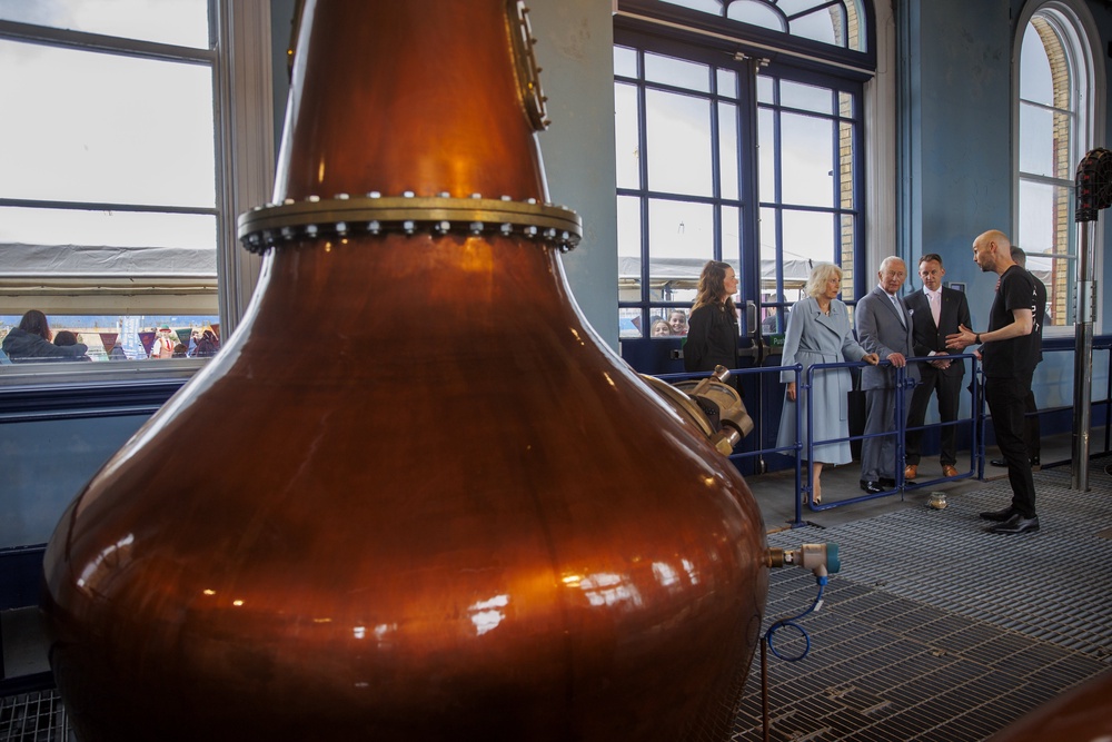 The couple were given a tour of Titanic Distillers, housed within a restored Edwardian pumphouse in the dockyard (Liam McBurney/PA) (PA Wire)