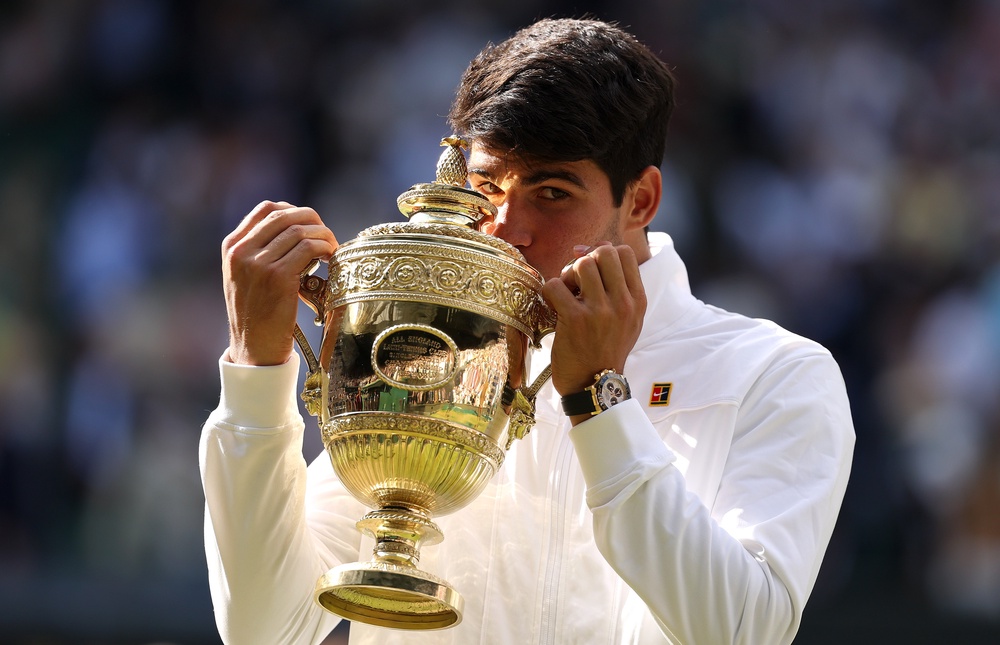 Alcaraz with the Wimbledon trophy in 2024 (Getty)