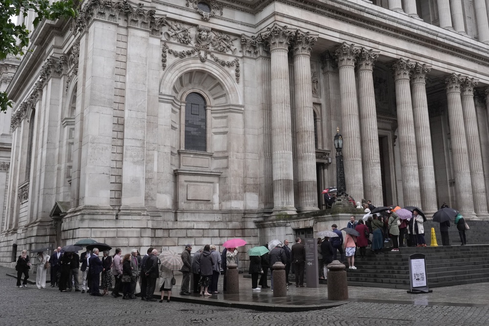 People queueing to attend a service of recognition, remembrance and reflection for members of the infected blood community, at St Paul’s Cathedral (Stefan Rousseau/PA) (PA Wire)