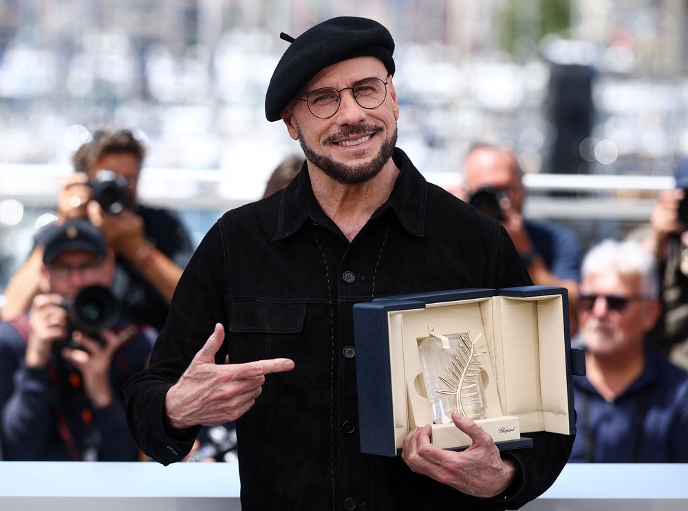 John Travolta was awarded the Honorary Palme d'Or at the 79th Cannes Film Festival (Reuters)
