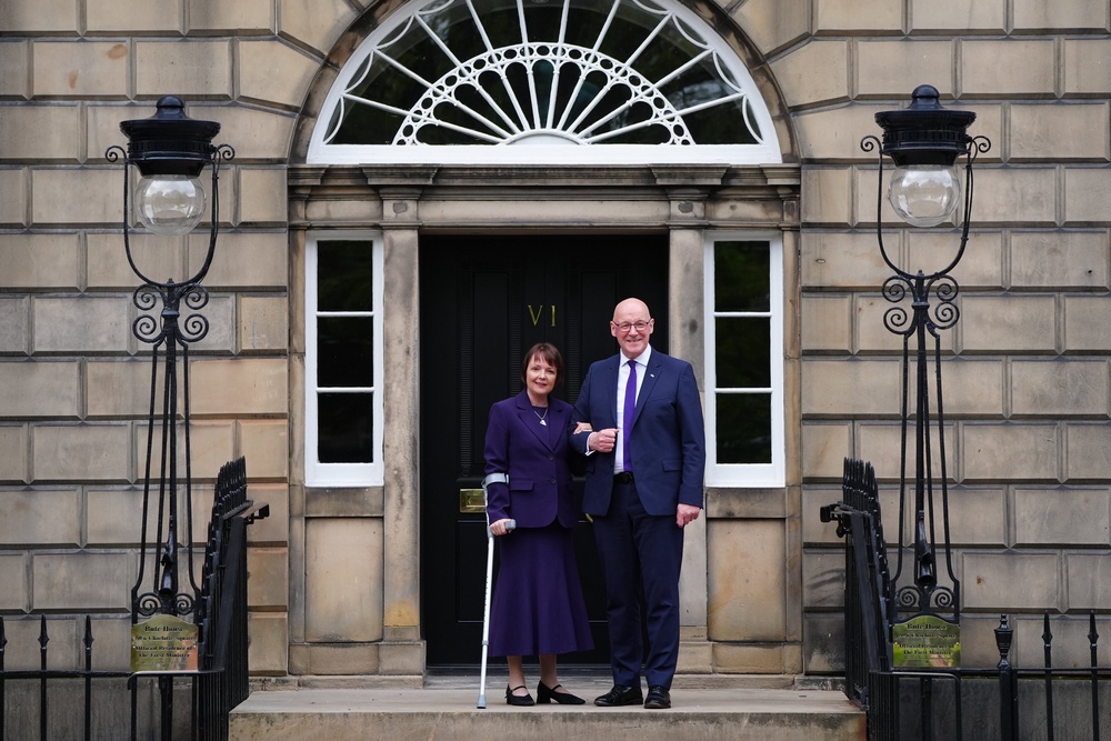 John Swinney with his wife Elizabeth outside Bute House in Edinburgh (Jane Barlow/PA) (PA Wire)