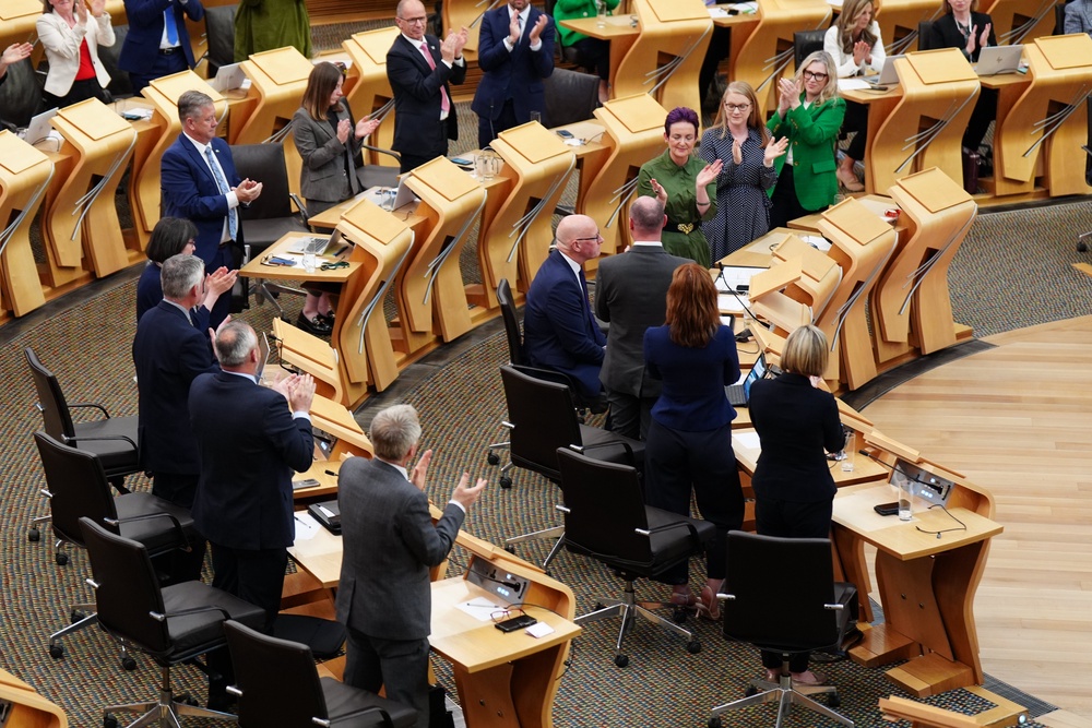 It is likely Mr Swinney, seated, will look to bring in fresh talent from the SNP benches to the Cabinet room (Jane Barlow/PA) (PA Wire)