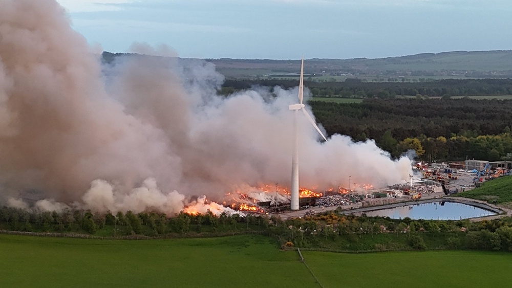 The blaze at a waste facility in Ladybank, Fife where firefighters have worked through a second night tackling the landfill fire (PA)
