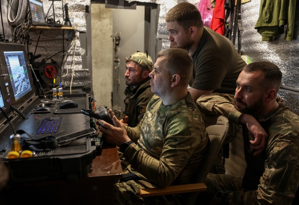 Ukrainian servicemen near the front line in Donetsk region, Ukraine, 18 May 2026 (Reuters)