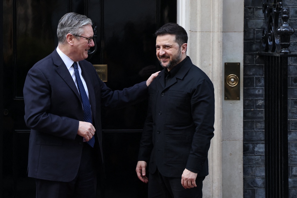 Keir Starmer welcomes Volodymyr Zelensky upon his arrival at 10 Downing Street, in central London (AFP/Getty)