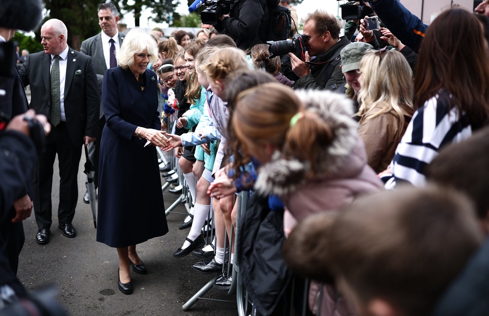 Camilla meets wellwishers on her walk through the village of Hillsborough (Henry Nicholls/PA) (PA Wire)