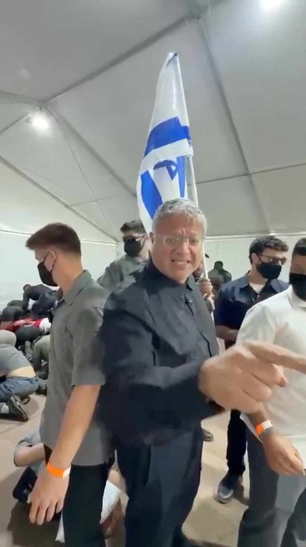 Israeli National Security Minister Itamar Ben Gvir reacts as flotilla activists are detained by Israeli forces, in Ashdod Port, Israel, in this screen grab taken from a video released on May 20, 2026 (Office Of Itamar Ben Gvir)