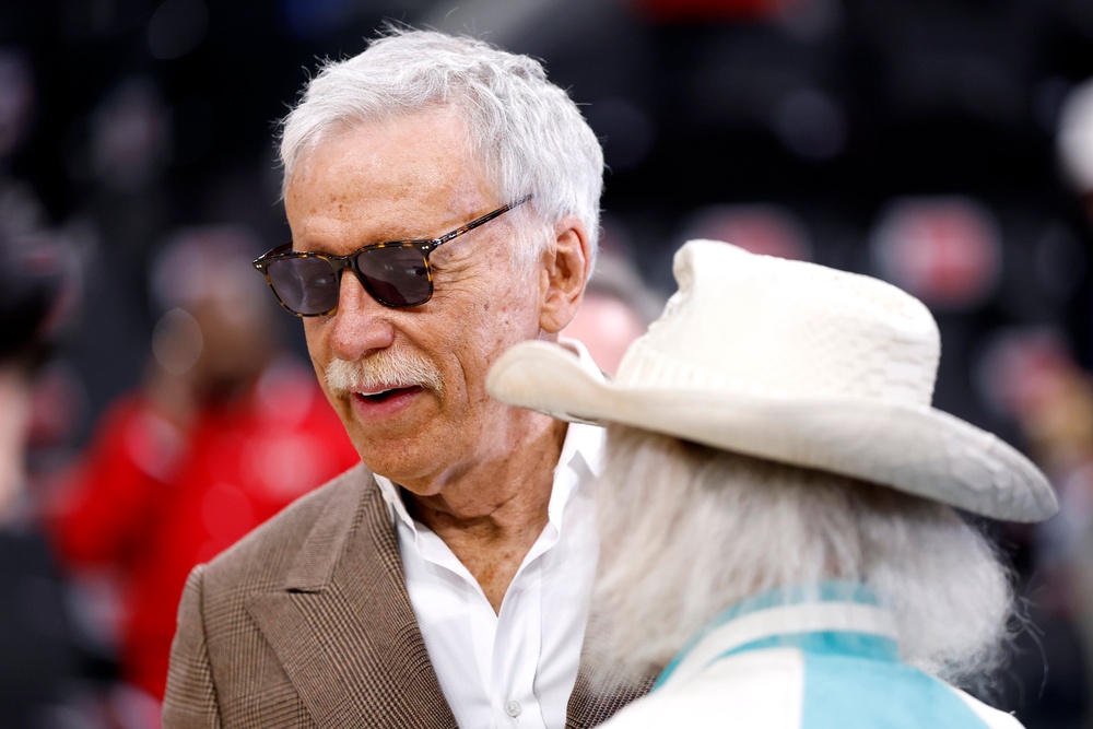 Kroenke speaks to a fan before his Denver Nuggets play the Los Angeles Clippers in Game 3 of the Western Conference First Round NBA Playoffs at the Intuit Dome in Inglewood, California, on April 24, 2025 (Getty)