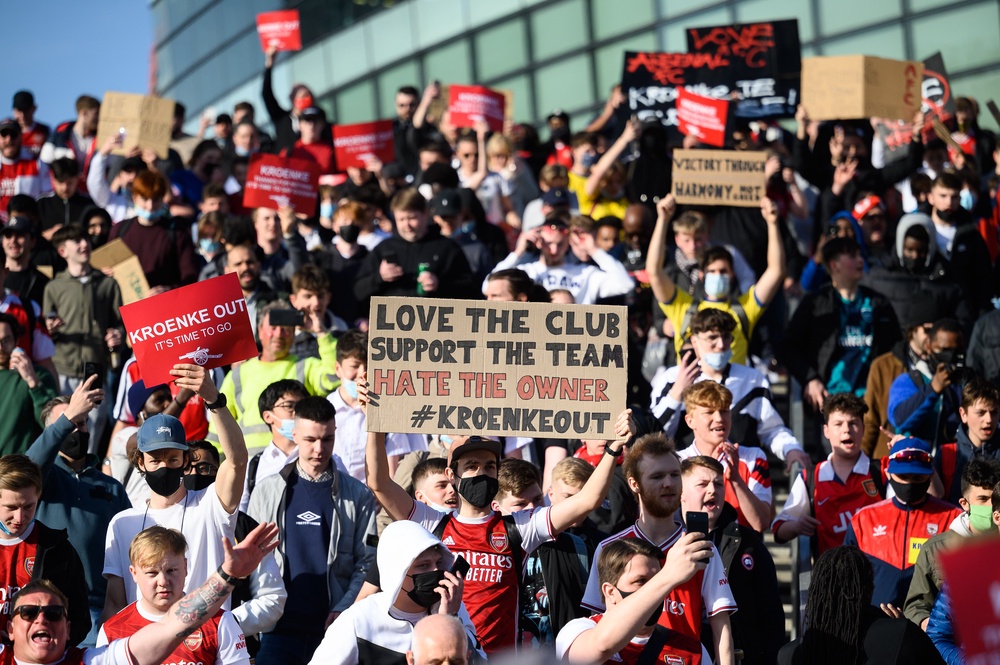 Kroenke has repeatedly faced protests from Arsenal fans who are seen here chanting and holding placards outside Emirates Stadium in London, England, on April 23, 2021 (Getty)