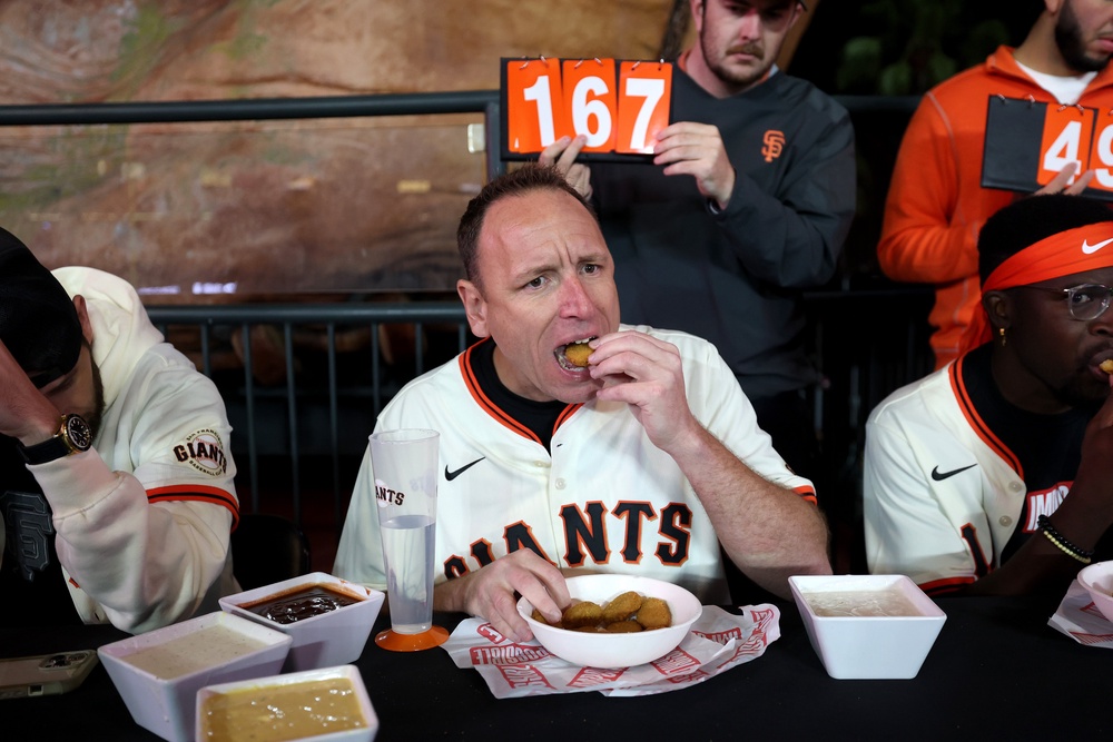 The competitive eating sensation was accused of slapping a man across the face during a late night out at an Indiana bar in April (Getty)