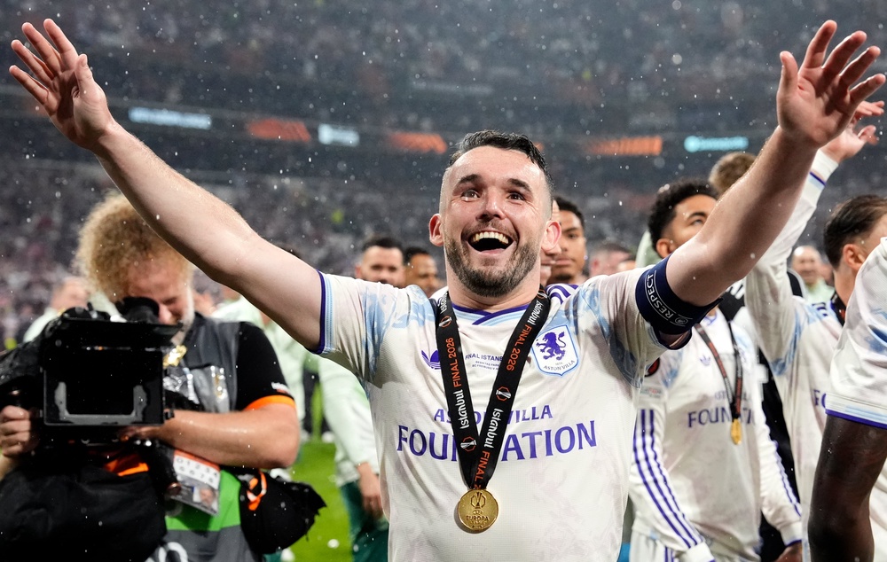 John McGinn led Aston Villa to Europa League glory (PA)